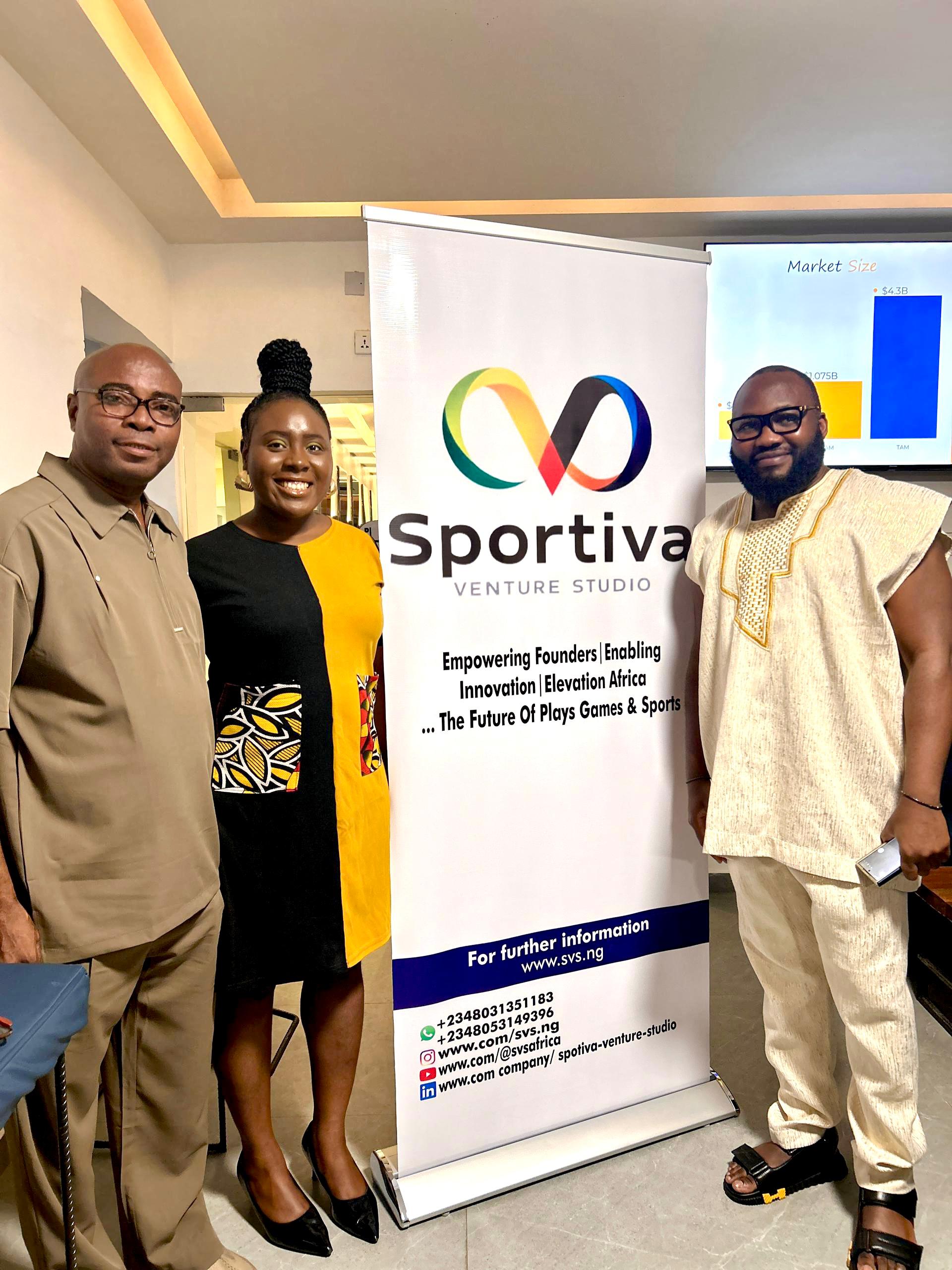 Team members with Sportiva banner